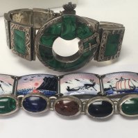 Three silver bracelets inset with hard stone and Enamel.