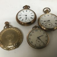 Four gold plated and metal cased pocket watches including a Hunter pocket watch.