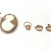 A 9ct gold cameo brooch earrings and ring. Postage B