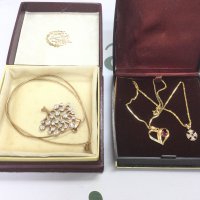 A silver gilt 'tree of life' pendant on chain silver gilt heart pendant and one other. Shipping category A.