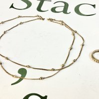 A 9 carat gold necklace and a 9ct ring , 10.1g total weight. Postage category A