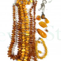 A collection of Amber beaded jewellery. (A)