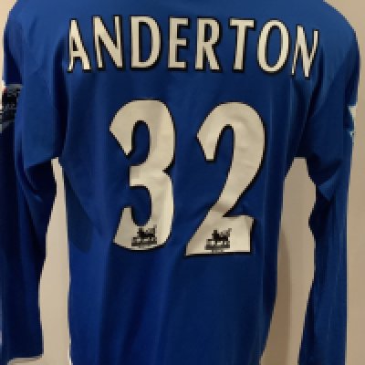 Birmingham City 2004 - 2005 Match Worn Football Shirt: Blue long sleeve shirt with Premier League badges to sleeves. Anderton 32 to rear. Signed by player with dedication. 