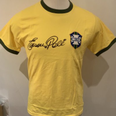 Pele Brazil 1970 World Cup Final Signed Replica Shirt: Yellow short sleeve shirt signed to front with full signature by Edson Pele. COA from reputable source. 