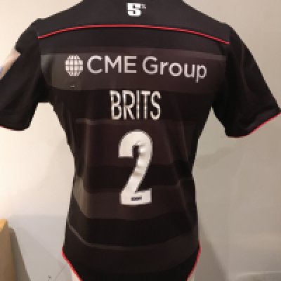 Saracens 2016 - 2017 Home Match Worn Rugby Union Football Shirt: Black short sleeve BLK large shirt worn by Schalk Brits with small tear to sleeve. Aviva Champions 2015/16 badging. GPS tracking pocket present at neck.
