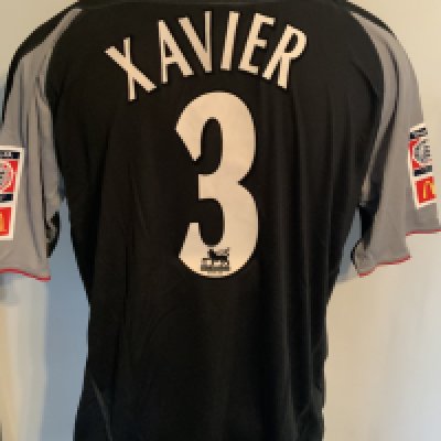 Liverpool 2002 Match Issued Charity Shield Football Shirt: Black short sleeve  Reebok shirt with FA Community Shield badging to sleeves. Xavier 3 to rear. Issued v Arsenal on 11 August 2002. Comes with signed COA from the player. Matchday programme is included.