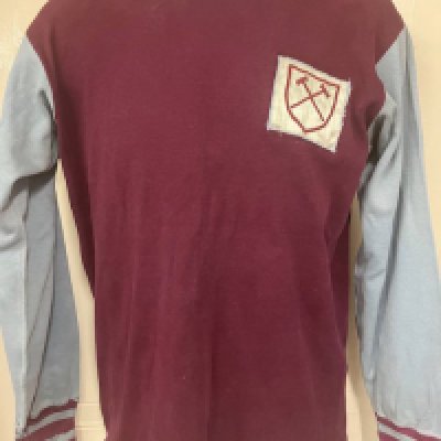 Bobby Moore West Ham Match Worn Football Shirt: Purchased by vendor in the 60s from West Ham member of staff Stan Botham. Legal letter stating this was a usual occurrence for Mr Botham to sell shirts that were not good enough to wear anymore. Mr Botham did most jobs for the club including groundsman, photographer, clerk of works and more. The vendor purchased this shirt for half a crown at Chadwell Heath training ground amongst others which are not in this auction. Shirt was worn afterwards and has wear and faults. 