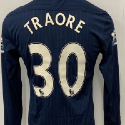 Arsenal 2009 - 2010 Away Match Issued Football Shirt: Blue pin striped long sleeve Nike shirt with Premier League badging to sleeves. Traore 30 to rear.
