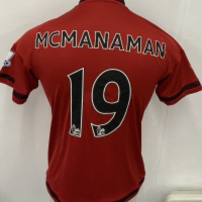 West Brom 2015 - 2016 Match Worn Football Shirt: Red and black pin striped short sleeve shirt with Premier League badging to sleeves. McManaman 19 to rear. 