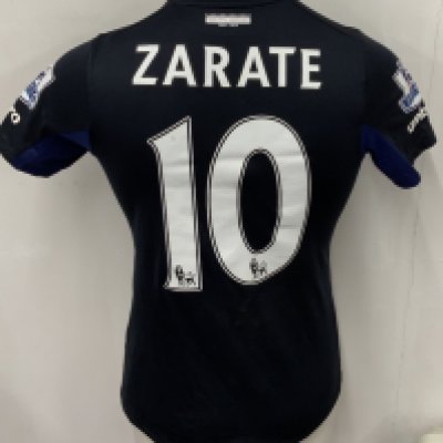 West Ham 2015 - 2016 Match Worn Football Shirt: Black short sleeve shirt with Premier League badging to sleeves. Zarate 10 to rear. Shirt is unwashed. 
