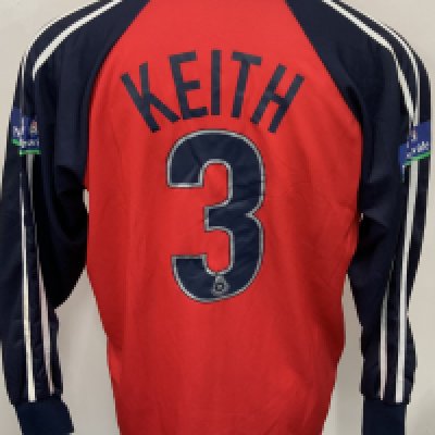 Colchester United 2001 - 2002 Match Worn Football Shirt: Red long sleeve third shirt with Nationwide League badging to sleeves. Keith 3 to rear. Signed to front by the player. 