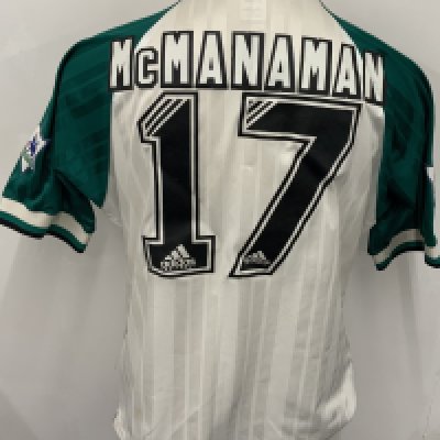 Liverpool 1993 - 1995 Match Worn Signed Football Shirt: Green white and black Carlsberg Adidas short sleeve shirt with Premier League badging to sleeves. Number 17 McManaman to rear. Staining to front which is signed by 11 players including Rush and Clough. 