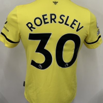 Brentford 2021 - 2022 Match Worn Football Shirt: Yellow away short sleeve shirt with Premier League badging to sleeves. Roerslev 30 to rear. Worn v Tottenham on 2 December 2021.