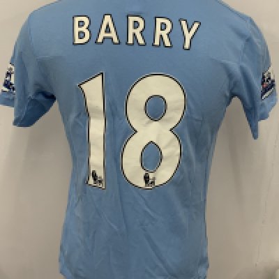 Manchester City 2009 - 2010 Barry Match Worn Football Shirt: Blue short sleeve Umbro shirt from 1st season of Etihad Sponsorship. Premier League badging to sleeve and Barry 18 to rear. 
