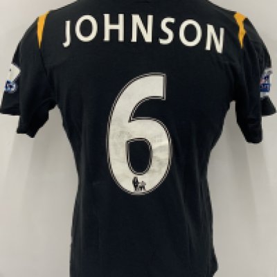 Manchester City 2009 - 2010 M Johnson Match Issued Football Shirt: Black short sleeve Umbro shirt from 1st season of Etihad Sponsorship. Premier League badging to sleeve and Johnson 6 to rear. 