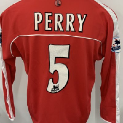 Charlton Athletic 2003 - 2005 Match Worn Football Shirt: Red long sleeve shirt. Number 5 Perry. PremierLeague badging. Unwashed shirt.