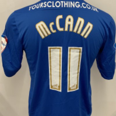Peterborough United 2012 - 2013 Match Worn Football Shirt: Blue short sleeve shirt. Number 11 McCann. NPower League badging. 