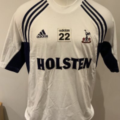 Tottenham 2001 - 2002 Football Players Training Kit: Number 22. Comprises of one blue and one white Adidas  Holsten tee shirt. (2)