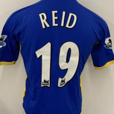 Tottenham 2005 - 2006 Match Worn Football Shirt: Blue short sleeve shirt with Reid 19 to rear. Worn v Fulham at Craven Cottage. Premier League badging to sleeves. 