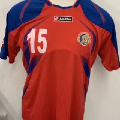 Costa Rica 2009 Match Worn Football Shirt: Red short sleeve shirt. Number 15. Worn by Junior Diaz in World Cup Qualifier v Uruguay on 14 November 2009. World Cup badge to sleeve. 