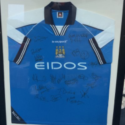 Manchester City 2000 - 2001 Framed Signed Football Shirt: Squad signed home size 46/48 shirt. Frame measures approximately 40 inches by 33 inches. No COA. Not for posting. 