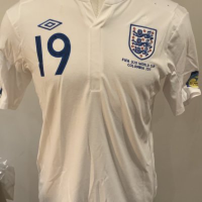 England 2011 Match Worn Under 20 Football Shirt: White short sleeve shirt with Wabara 19 to rear. Worn in the Under 20 World Cup Tournament in Columbia. Wabara played in every match. 