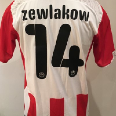 Olympiakos 2009 - 2010 Match Worn Football Shirt: Red and white short sleeve shirt with Zewlakow 14 to rear. Worn v Tottenham on 9 August 2009 in a friendly match.
