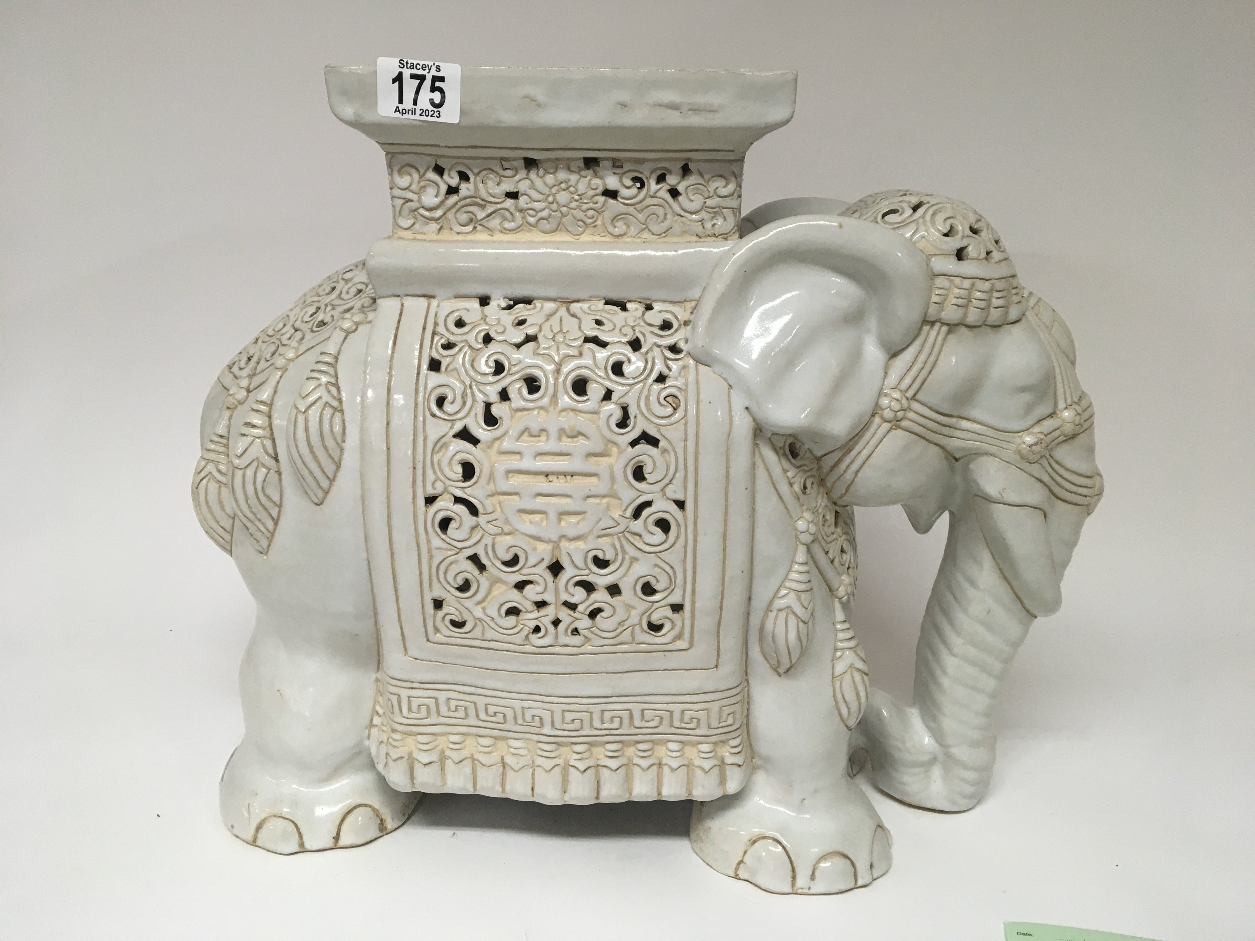 A 20th century Chinese garden seat in the form of an elephant.
