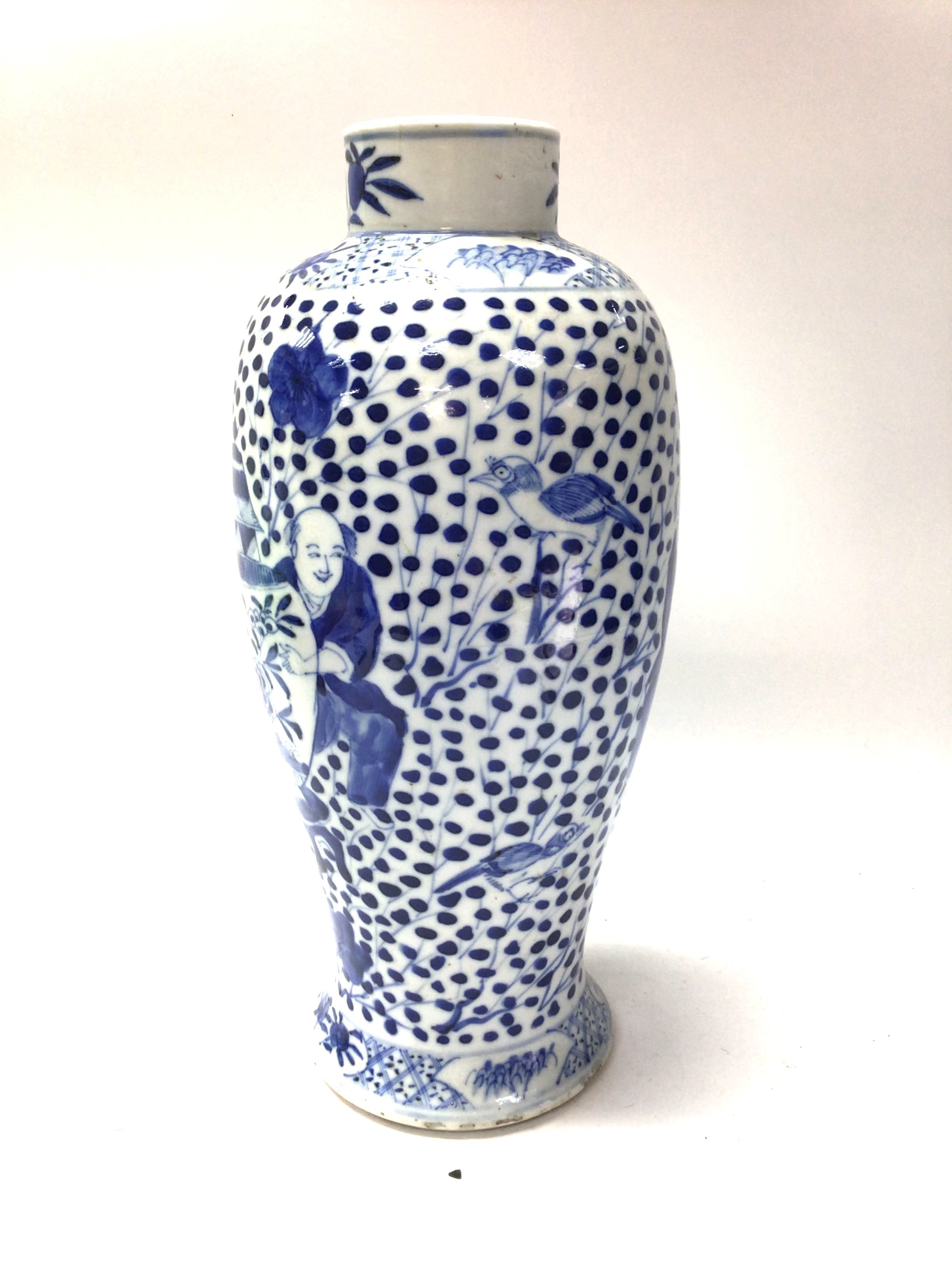 A Chinese blue and white green porcelain vase with hand painted decoration, 4 character mark to the underside.