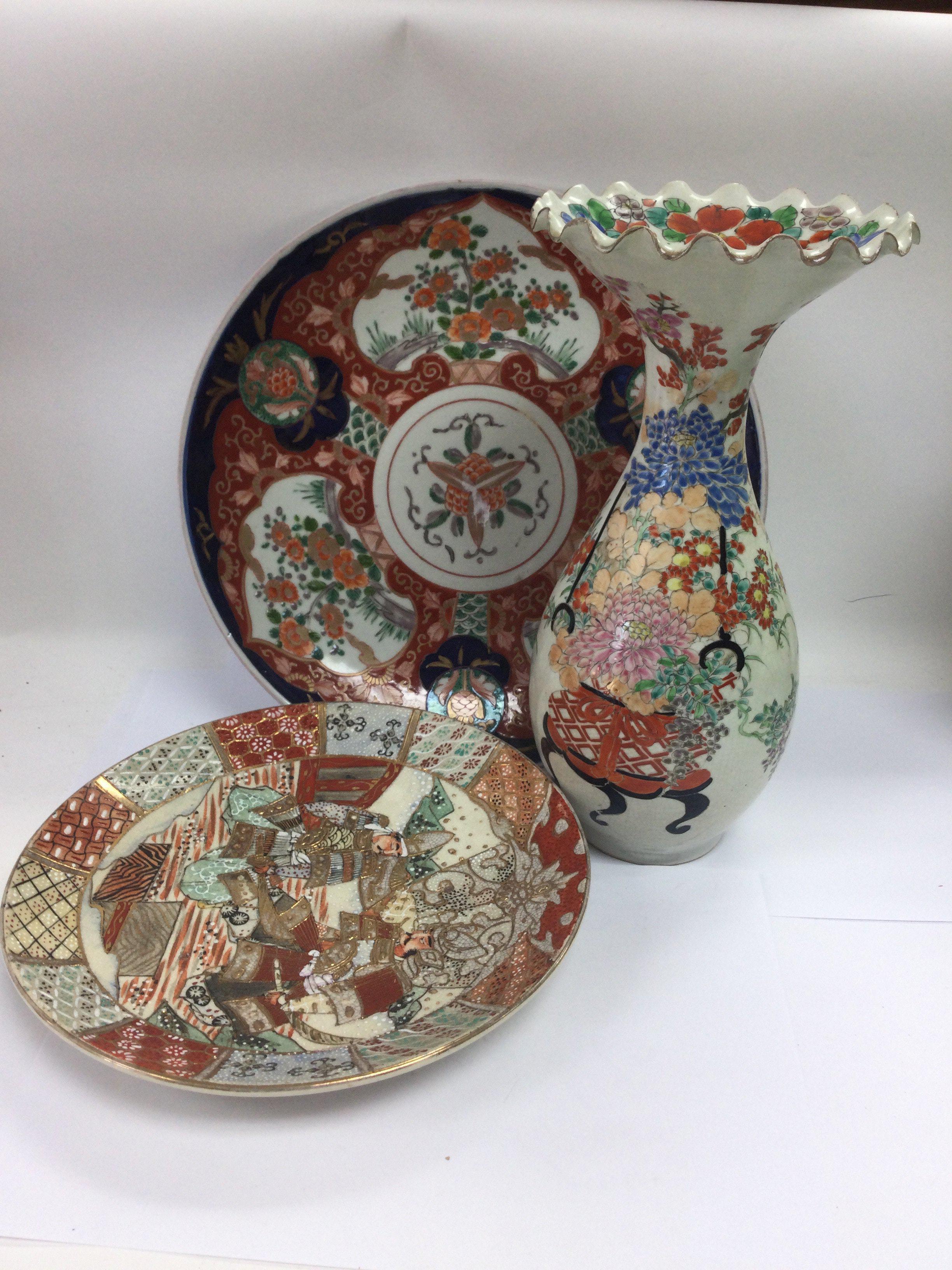 An Imari plate, Satsuma dish and vase (3). Imari plate diameter approx 31cm. Shipping category D.