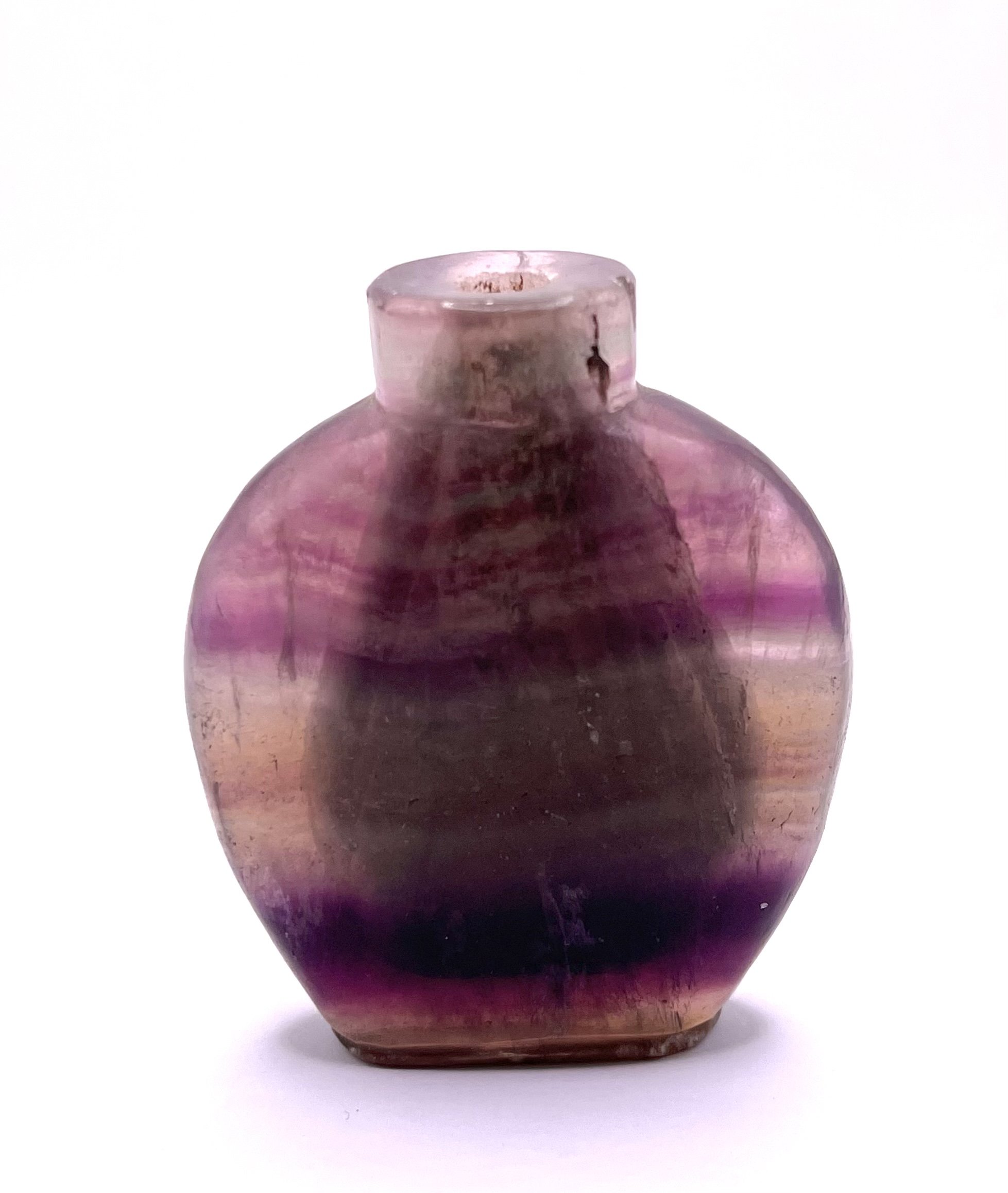 A 19thC banded amethyst snuff bottle, 7.5cm, with Chinese customs export label attached.