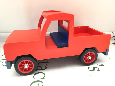 A Julip Red Land-Rover.