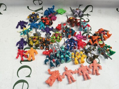 A Collection Of Battle Beasts And Muscle Men.