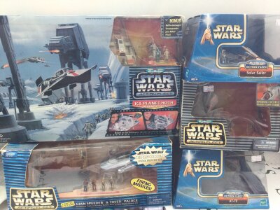 A Collection Of Boxed Star Wars Micro Machines Action Fleet.