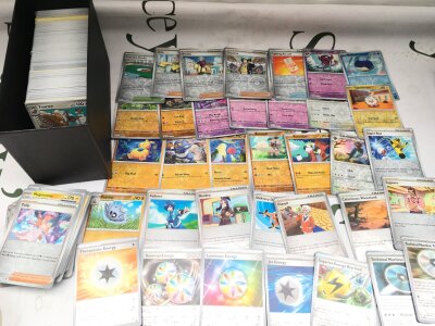 A Collection Of Over 500 Pokemon Cards In Elite Trainer Box Containing Holographic And Reverse Holos.