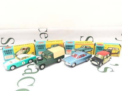 4 X Boxed Corgi Diecast Vehicles. A Aston Martin Comp Model #309, A Land-Rover #438, A Rover 2000 #252 And A Mini-Cooper #249.
