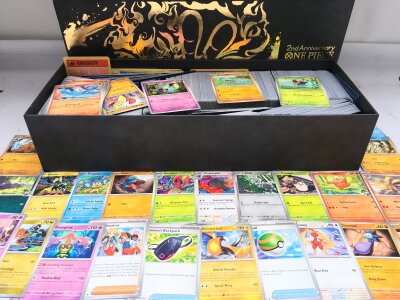 A Large Collection Of Pokemon Cards Including Vintage Wizards Of The Coast.