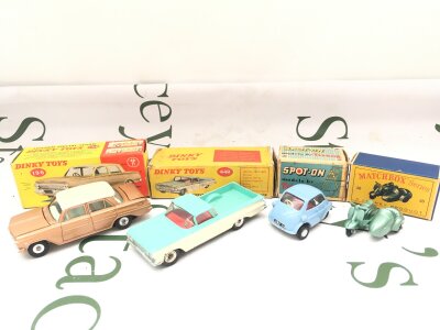 A Boxed Dinky Holden Special Sedan #196 A Chevrolet El Camino Pick up Truck #449, A Spot-On B.M.W. Isetta #118 And A Matchbox Motor Scooter And Sidecar #36
