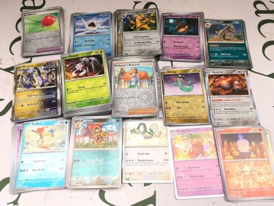 250 holographic Pokemon Cards From Various Sets including Rares And Reverse Holographic. No Reserve.