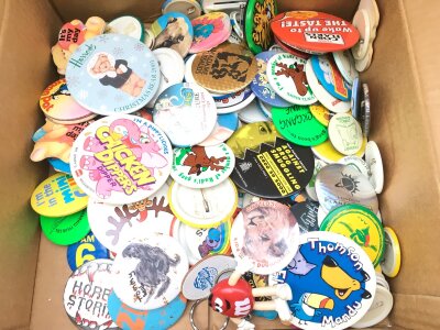 A Box Containing Various Vintage Badges. No Reserve.