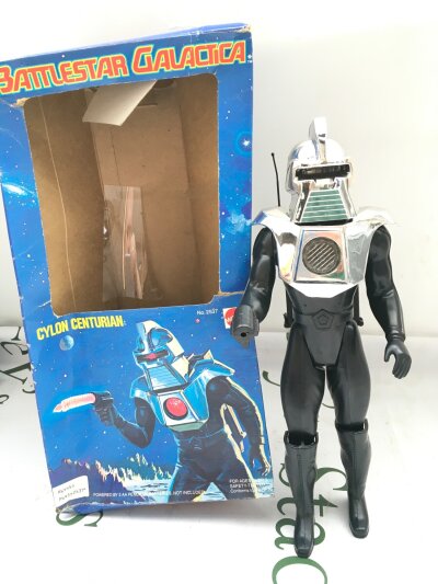 A Boxed Mattel Battlestar Galactica 12" Cylon Centurian. Box Is Worn. No Reserve.