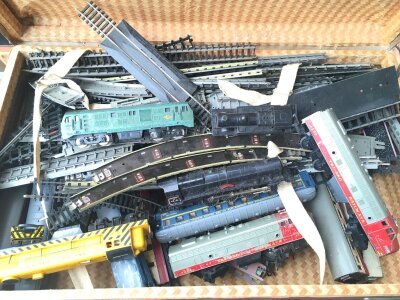2 Cases Containing 00 Gauge And H0 Gauge Locos Track And Accessories. (2).