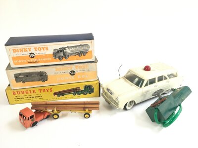 A Boxed Budgie Toys Timer Transporter, 2 Dinky Empty Boxes And A Marx Motorway Police Patrol Car.