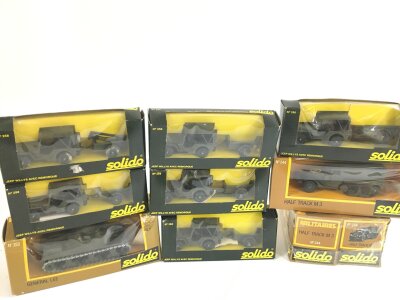 A Collection Of Boxed Solido Military Vehicles Including 5 X Willys Jeeps, 3 Half Tracks, A M41 Tank Destroyer And A General Lee Tank.