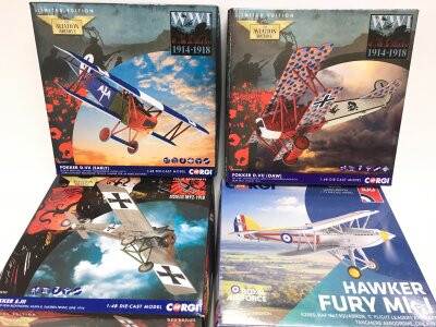 4 Boxed Corgi Aviation Archive Aircraft A Hawker Fury MK.I #AA27304, A Fokker D.VII #AA38907, A Fokker D.VII #AA38908 And A Fokker E.III #AA28702.
