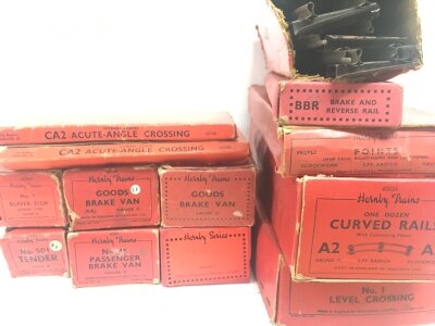 A Collection Of Boxed Hornby 0 Gauge Vans, Track,Turntables Etc. Also Loose Track.