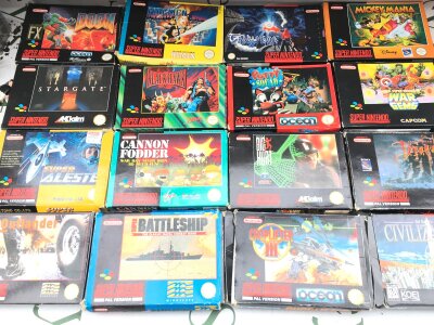 A Collection Of Boxed Super Nintendo Games all With Manuals. 30 In Total.
