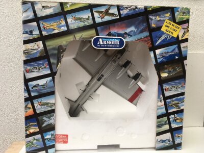 A large boxed Franklin Mint model aircraft in the ARMOUR collection.  1:48 scale diecast of a B17 Flying Fortress CAROLINA MOON.   No reserve