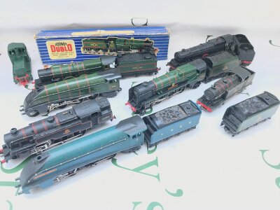 A Collection Of 00 Gauge 3 And 2 Rail Locomotives, Coaches, Wagons And Accessories.
