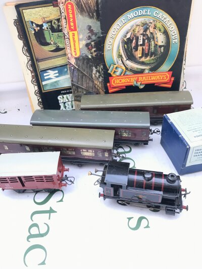 A Small Collection Of 0 Gauge Including A Hornby Clockwork BR 0-4-0 Tank Loco.